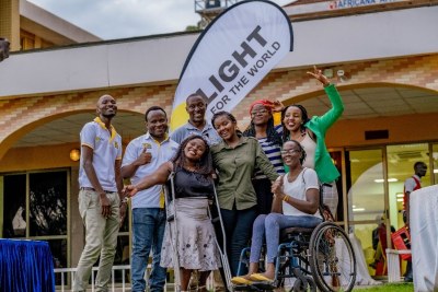 Light for the World Team, Disability Inclusion Facilitators, and member of partner organizations celebrate a successful career fair for youth with disabilities.