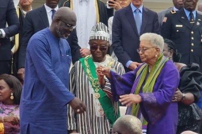 The peaceful transfer of power in Liberia as newly elected Joseph Boakai (center) becomes the new president, replacing president George Weah (on the left), who in 2018 replaced president Ellen Johnson Sirleaf (on the right).