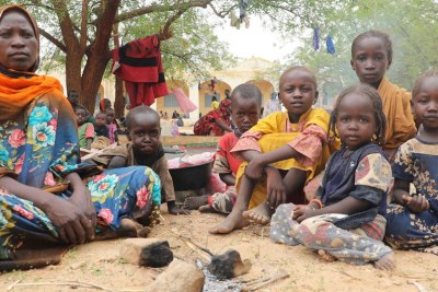 A Sudanese mother and her children take refuge in a town in Chad across the border from Darfur in Sudan.