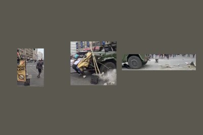 These are screenshots of a video showing an army vehicle driving into Mozambican protesters, then driving on - contradicting the Mozambican Defence Ministry statement saying a military vehicle 