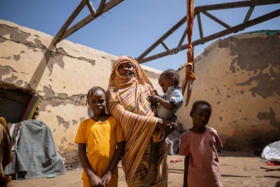 There are 14.6 million internally displaced people in Sudan, more than anywhere else in the world. Having been forced to flee their home in Khartoum, Altuma and her children live in this roofless shelter.