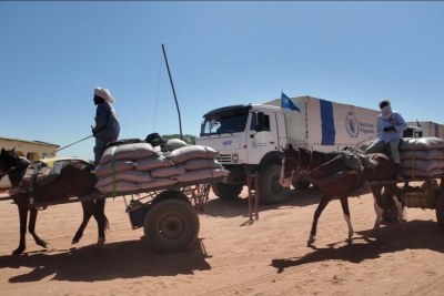 Trucks finally arrived at the famine-stricken Zamzam camp in North Darfur.