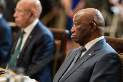 President Joseph Nyuma Boakai of Liberia listens as President Donald Trump answers questions from the press during a multilateral luncheon with African leaders (file photo).