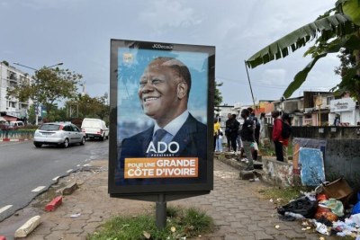 Poster for Alassane Ouattara's RHDP campaign in Cocody, Abidjan, Côte d'Ivoire, seen on 11 October 2025.