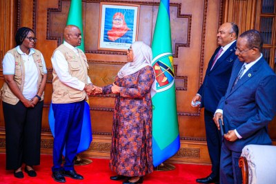 Tanzanian President Samia Suluhu Hassan, with former Botswana President Mokgweetsi E. K. Masisi, head of the African Union Election Observation Mission.
