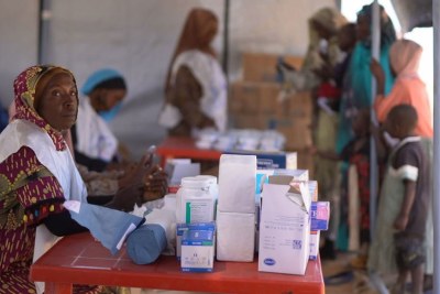 A UNICEF-supported mobile clinic provides healthcare to people displaced by violence in Darfur, Sudan.