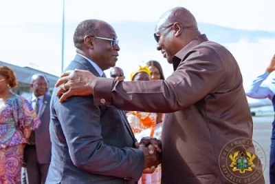 President Mahama (right) being welcomed by President Alassane Ouattara
